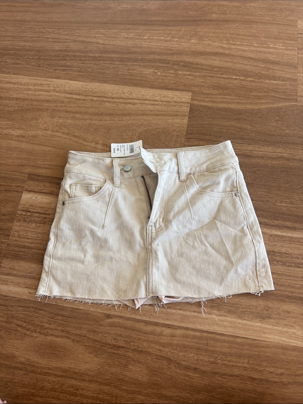 Cream Denim Mini Skirt with Frayed Hem